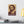 Canvas wall art stylized illustration of Greek playwright Euripides above a modern desk on a white wall