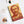 Spiral notebook with a bold orange and yellow illustration of Greek historian Herodotus on a white surface