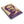 Spiral notebook with a purple and beige portrait of Pericles lying flat on a white surface