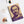 Spiral notebook with a purple and beige portrait of Pericles lying flat on a white surface in context with other items