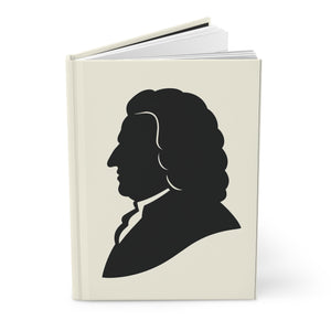 Hardcover journal with a black on ivory silhouette illustration of musician Johann Sebastian Bach opened