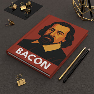 Hardcover journal with a bold illustration of philosopher Francis Bacon
on a dark surface