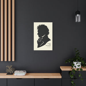 Canvas wall art with a black on ivory silhouette illustration of musician Ludwig van Beethoven on a wall in a modern interior setting