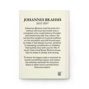 Hardcover journal with a black-on-ivory silhouette illustration of musician Johannes Brahms and a bio on the back cover