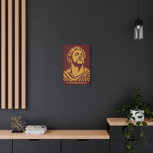 Canvas wall art with a bold illustration of Roman emperor Commodus on a dark wall above a wooden shelf.