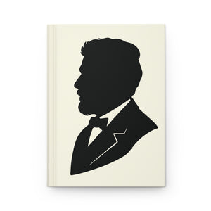 Hardcover journal with a black-on-ivory silhouette illustration of musician Claude Debussy