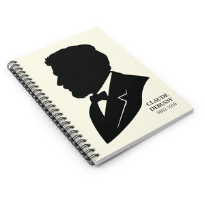 Spiral notebook with a black on ivory silhouette illustration of musician Claude Debussy on a white background