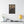 Canvas wall art with a beautiful, original illustration of Roman emperor Diocletian on a wall above a table with decor items.