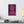 Canvas wall art with a bold illustration of Roman emperor Elagabalus on a white wall