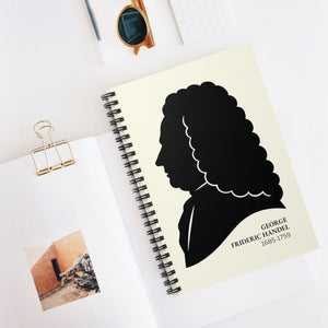 Spiral notebook with a black on ivory silhouette illustration of musician George Frideric Handel on a white surface