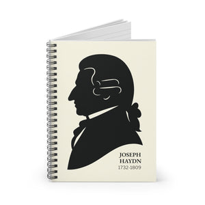 Spiral notebook with a black on ivory silhouette illustration of musician Joseph Haydn open view