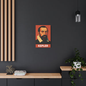 Canvas wall art with a bold illustration of astronomer Johannes Kepler on a dark wall above a wooden shelf