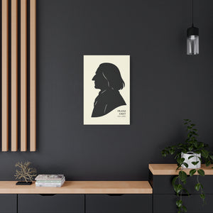 Canvas wall art with a black on ivory silhouette illustration of musician Franz Liszt on a dark wall with wooden shelves and decor.