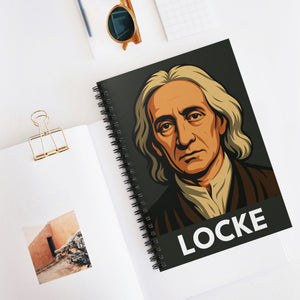 Spiral notebook with a bold illustration of philosopher John Locke on a white surface with a photo and glasses