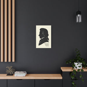 Canvas wall art with a black on ivory silhouette illustration of musician Wolfgang Amadeus Mozart on a dark wall with wooden shelves and plants.