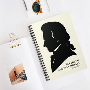 Spiral notebook with a black on ivory silhouette illustration of musician Wolfgang Amadeus Mozart
on a white surface