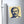 Rerfrigerator magnet with a bold illustration of ancient Greek philosopher Plato on a metallic surface