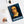 Spiral notebook with a bold illustration of philosopher Baruch Spinoza on a white surface with a photo and glasses