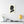 Canvas wall art with a black on ivory silhouette illustration of musician Pyotr Ilyich Tchaikovsky on a wall above a shelf with decor items.