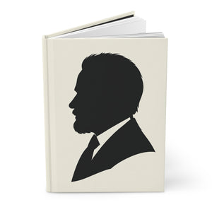 Hardcover journal with a black on ivory silhouette illustration of musician Pyotr Ilyich Tchaikovsky open view