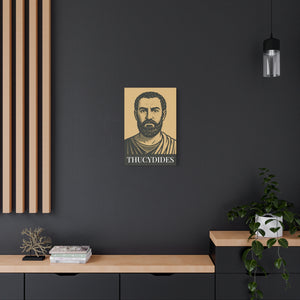 Canvas wall art with a bold black and beige illustration of ancient Greek historian Thucydides on a dark wall above a shelf