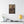 Canvas wall art with a beautiful, original illustration of Roman emperor Trajan on a wall above a table with decor items.