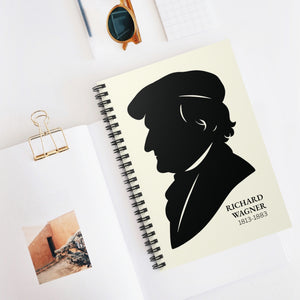Spiral notebook with a black on ivory silhouette illustration of musician Richard Wagner on a white surface